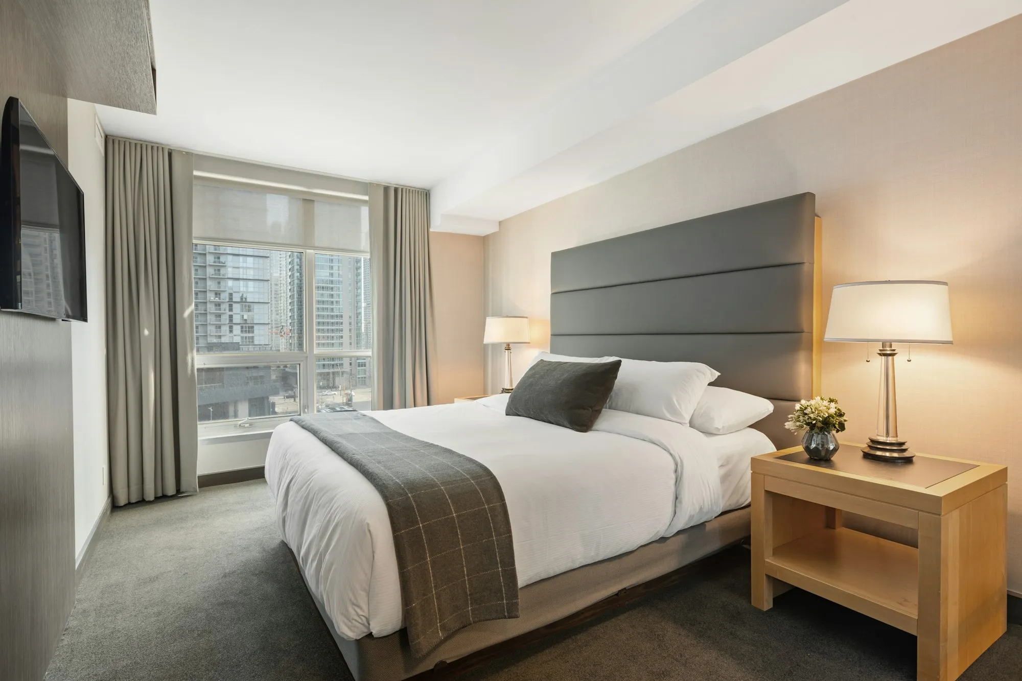 A freshly made hotel guest room